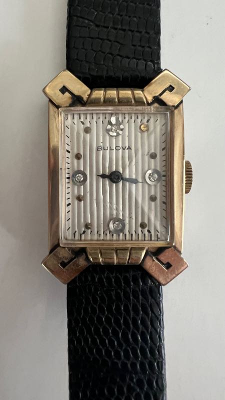 Front face of watch showing dial and case