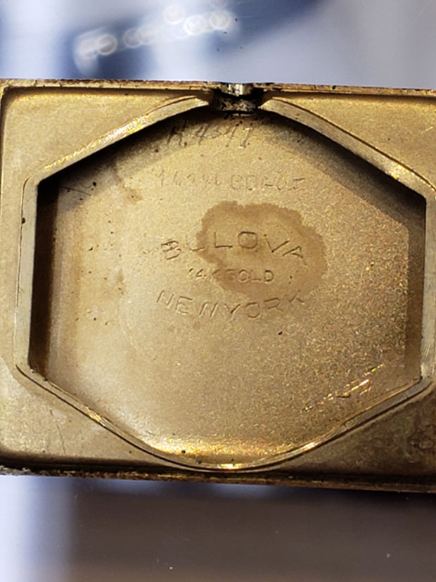 Inside of back case. Bulova 14k Gold New York.