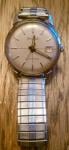Bulova 1965 stainless, white dial, date window, crosshairs, gold hands, seconds