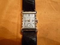 Bulova watch with diamond dial and fancy case