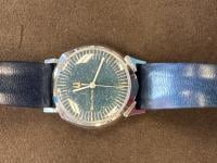 Blue dial with white speckles