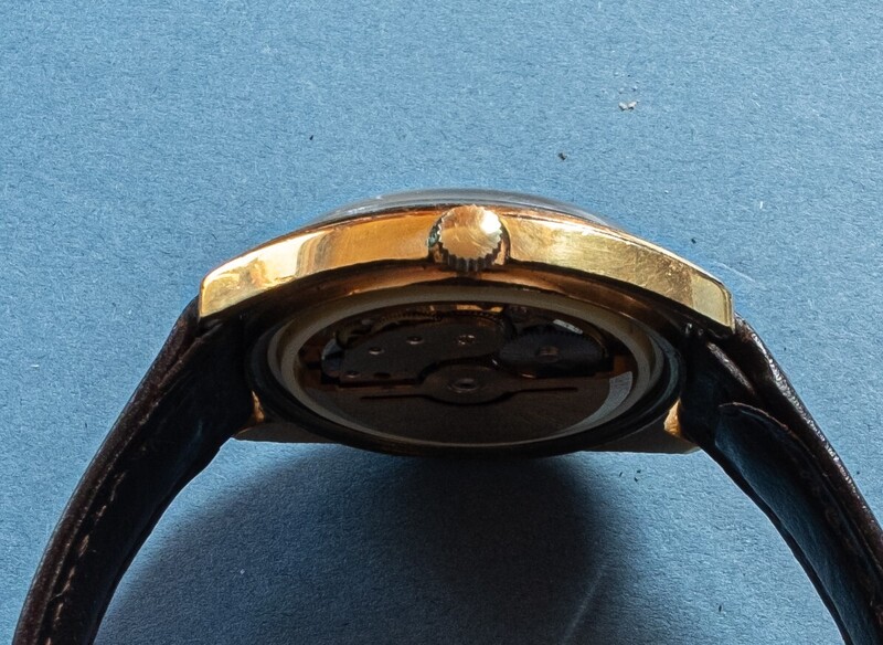 Image showing side of the watch including the crown wich has no detail or logo.