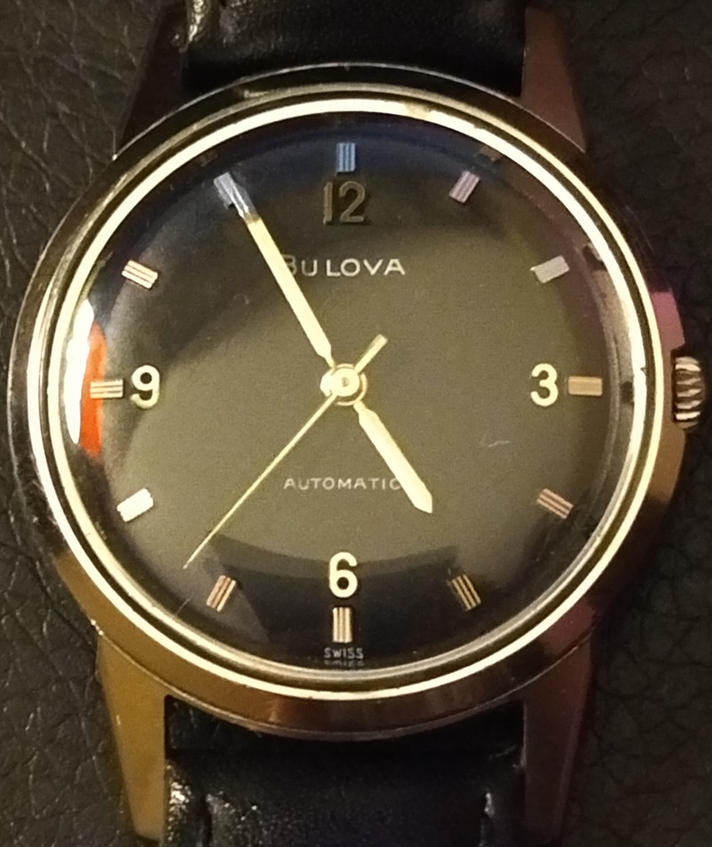 1966 Bulova watch, black dial.
