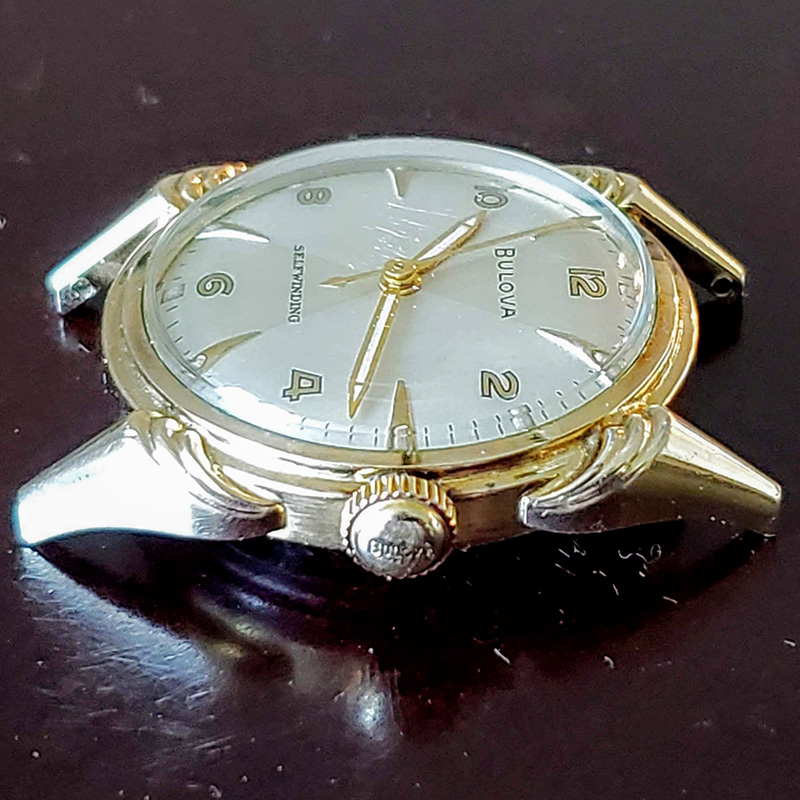1955 Bulova Royal Lancer vintage automatic watch showing detail of crown and face