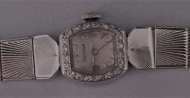 Watch case and two links each side to show art deco design